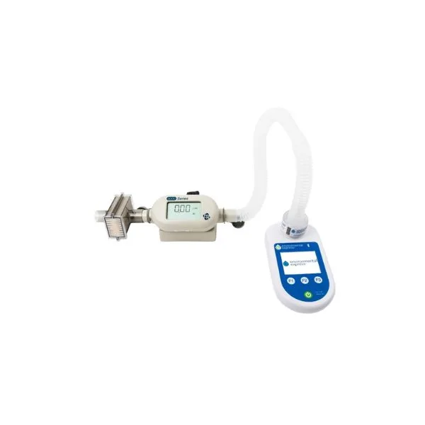 A primary flow calibrator connected in line with the sampling pump